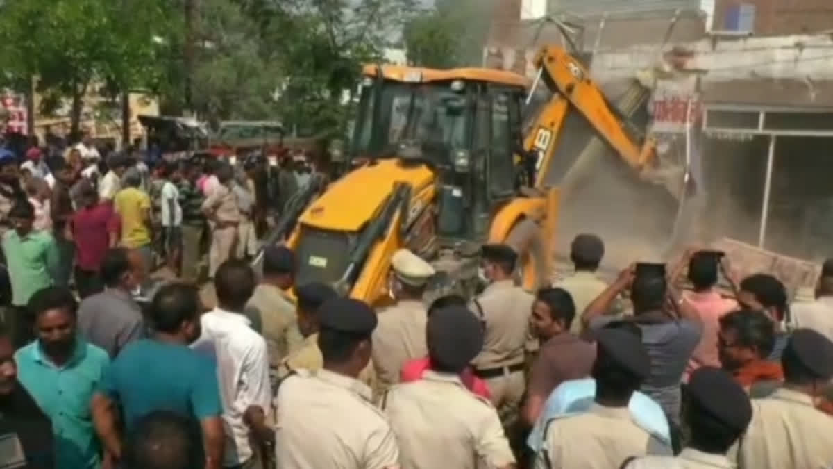 Bulldozer against encroachment