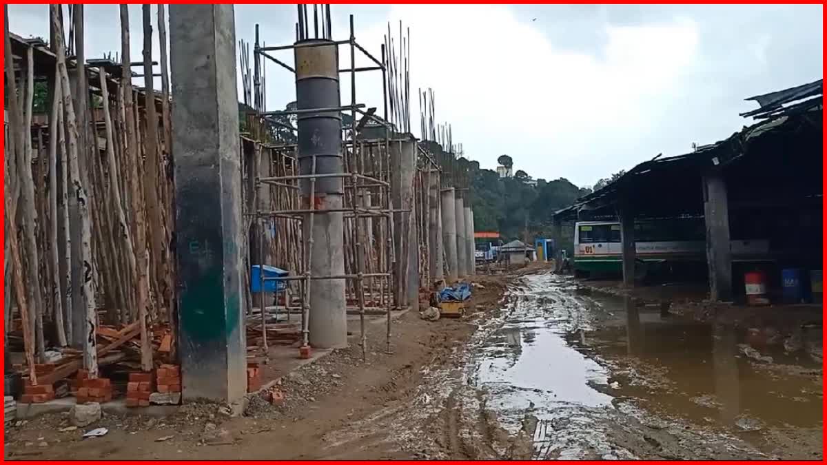 HRTC grinding mill workers repairing buses on road