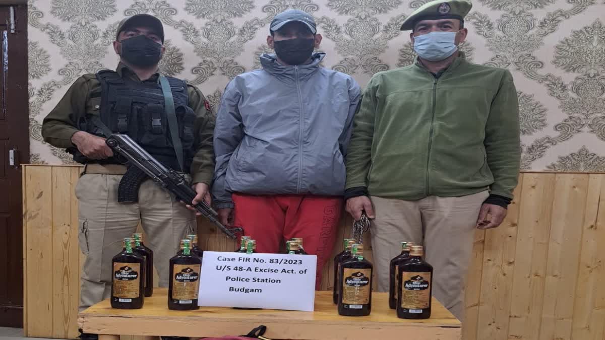 bootlegger-arrested-in-budgam-12-bottles-of-illicit-liquor-recovered