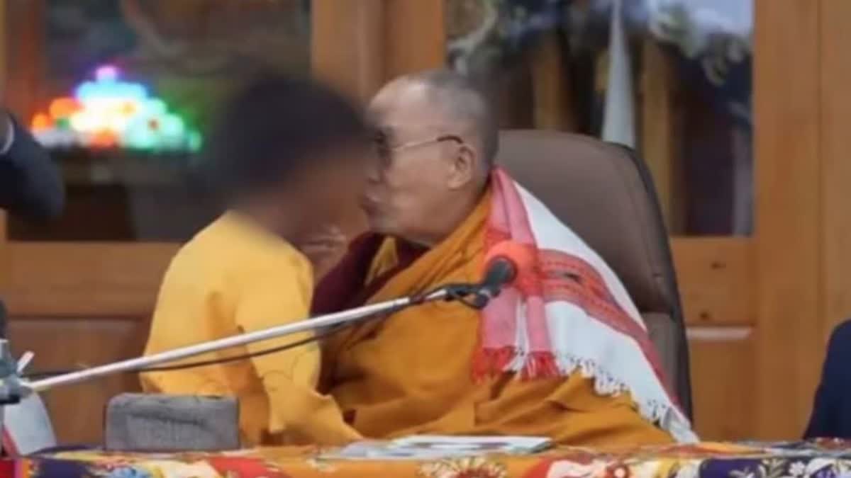 dalai lama caught on video kissing boy on lips