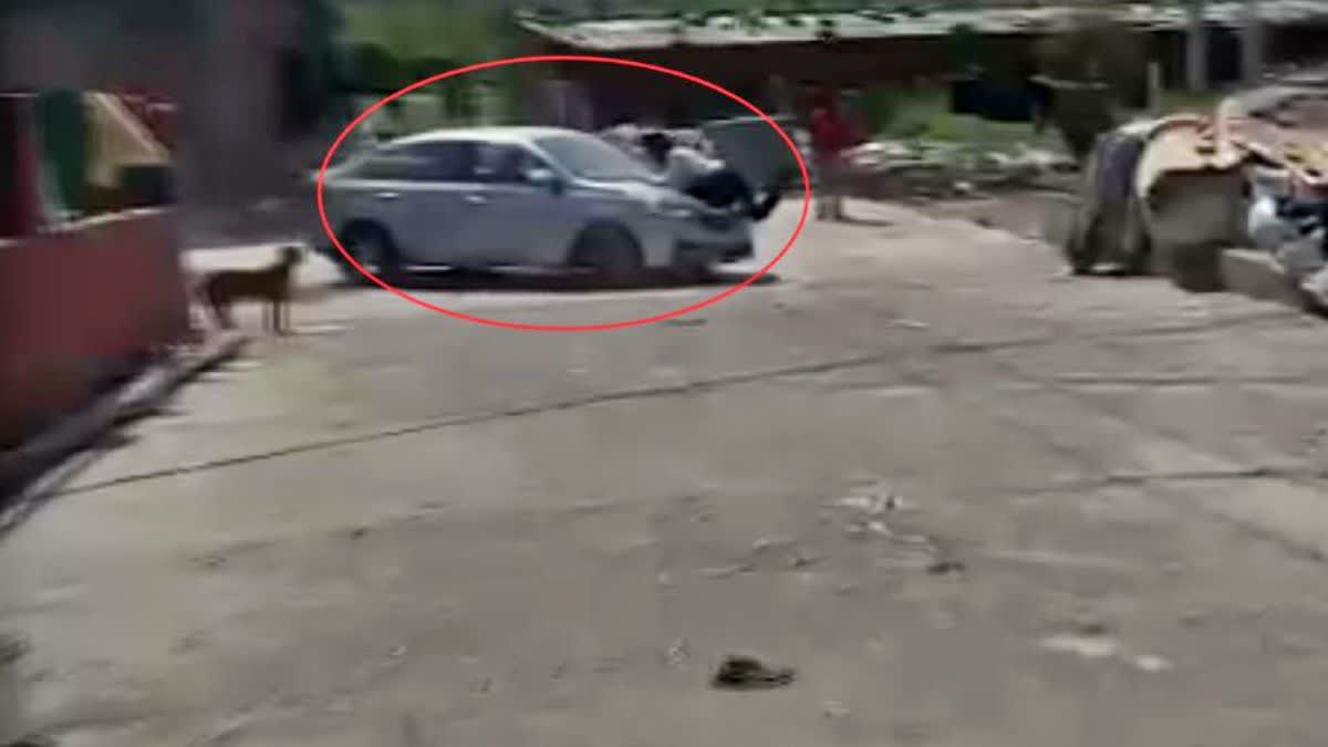 Traffic Cop Dragged On Car Bonnet