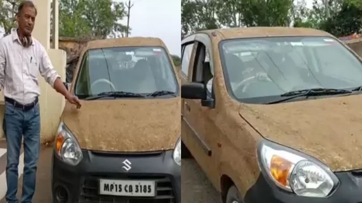 doctor coated layer of cow dung on his car