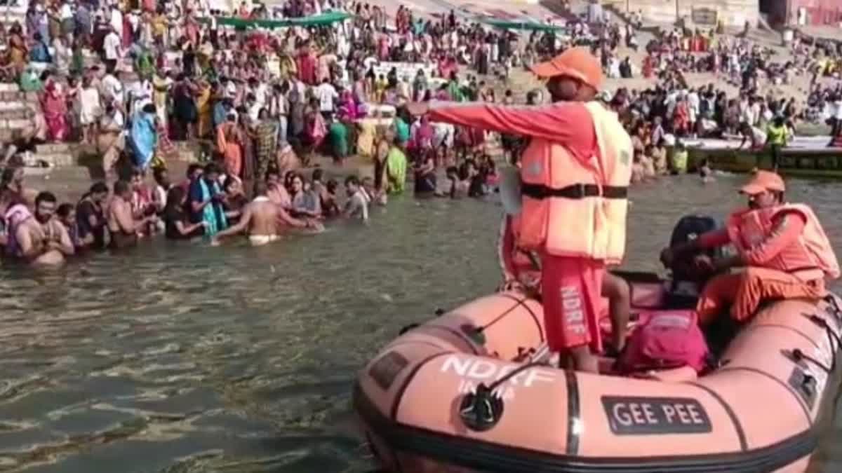 NDRF team making devotees aware in Telugu language at Dashashwamedh Ghat in Pushkar fair