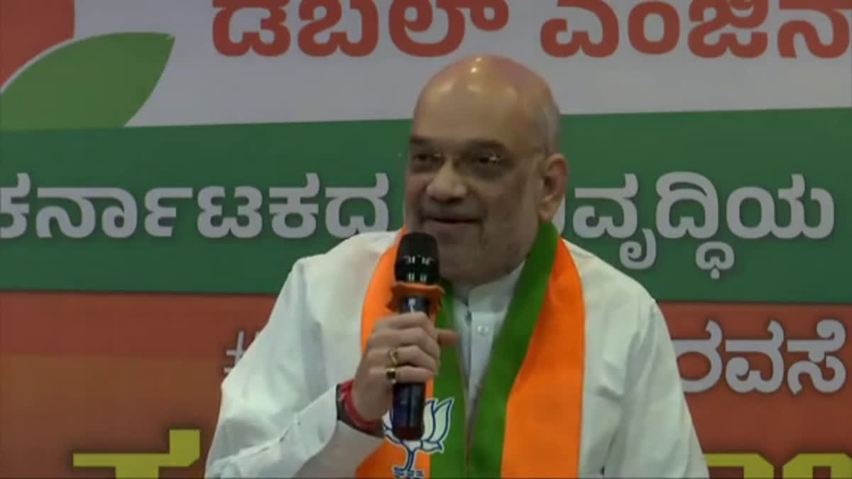 Union Home Minister Amit Shah talking to reporters in Karnataka