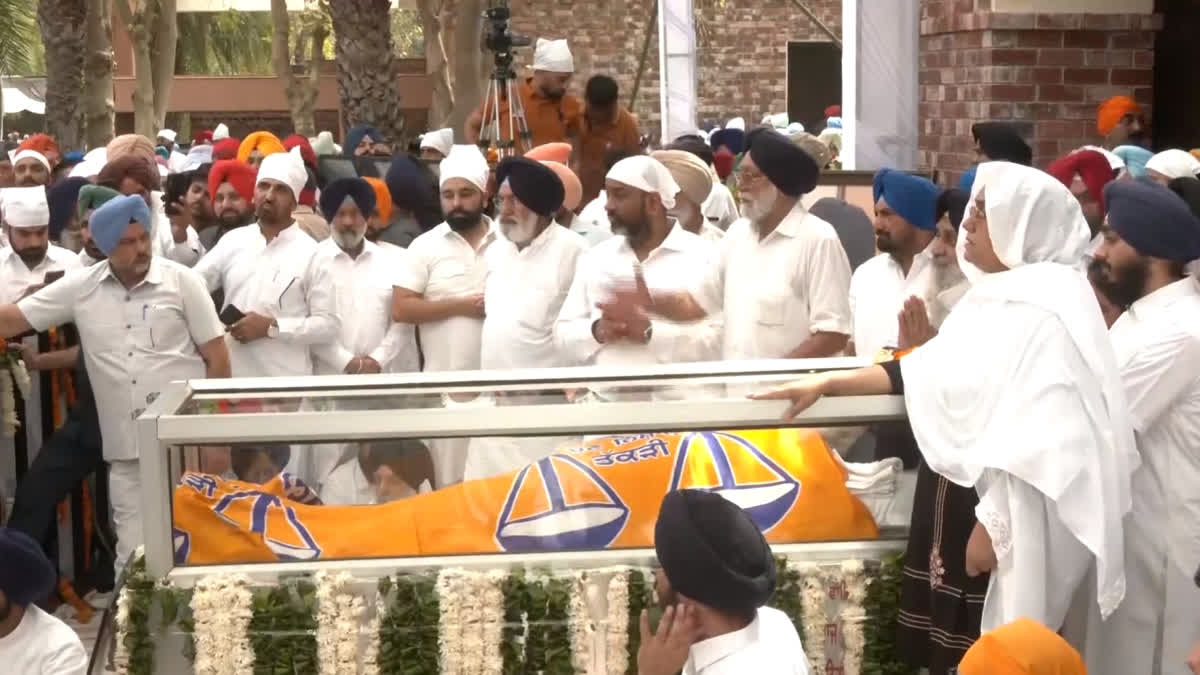 Mourners line up to pay last respects to Badal at his ancestral village