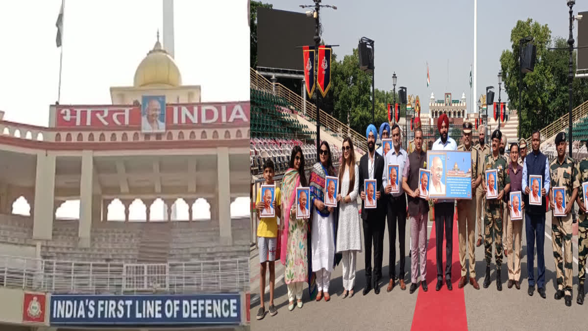 Portrait of Mahatma Gandhi mounted on the audience gallery at the Attari border