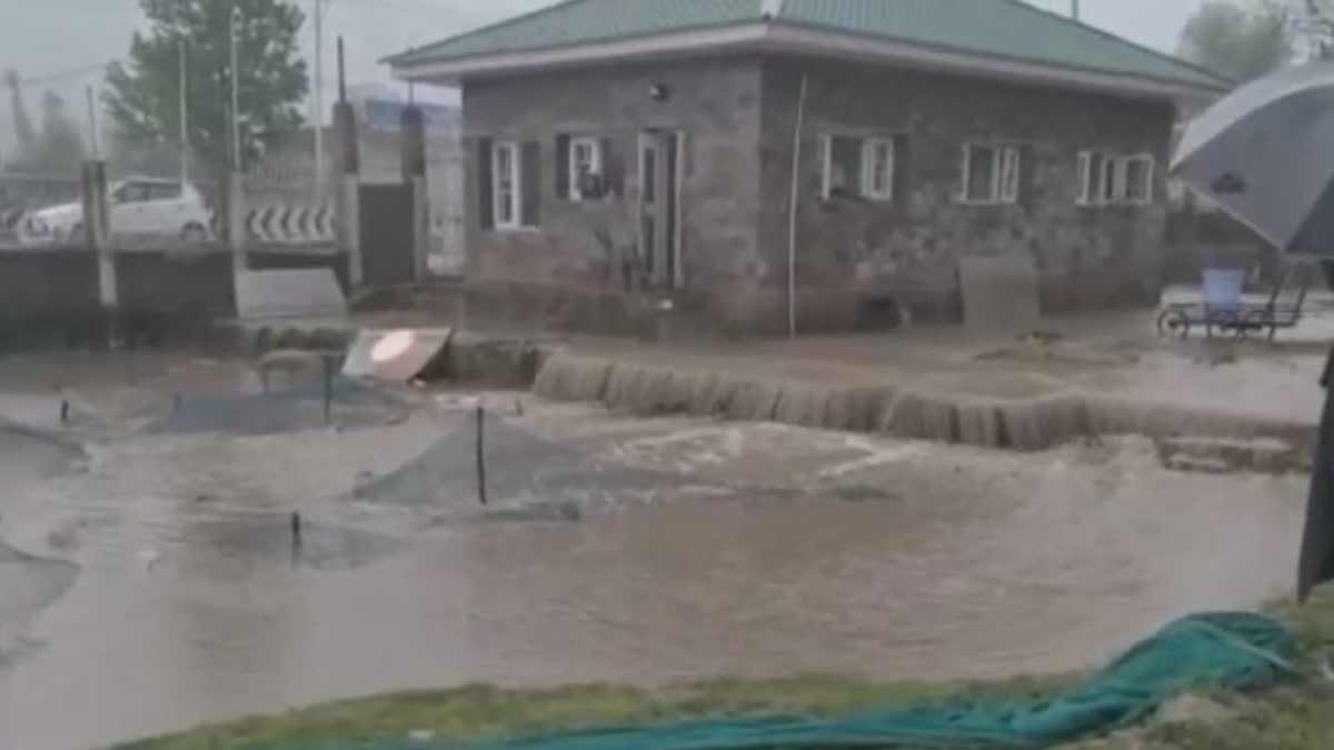 flash-flood-in-kokernag-muddy-water-enters-asia-largest-fish-farm