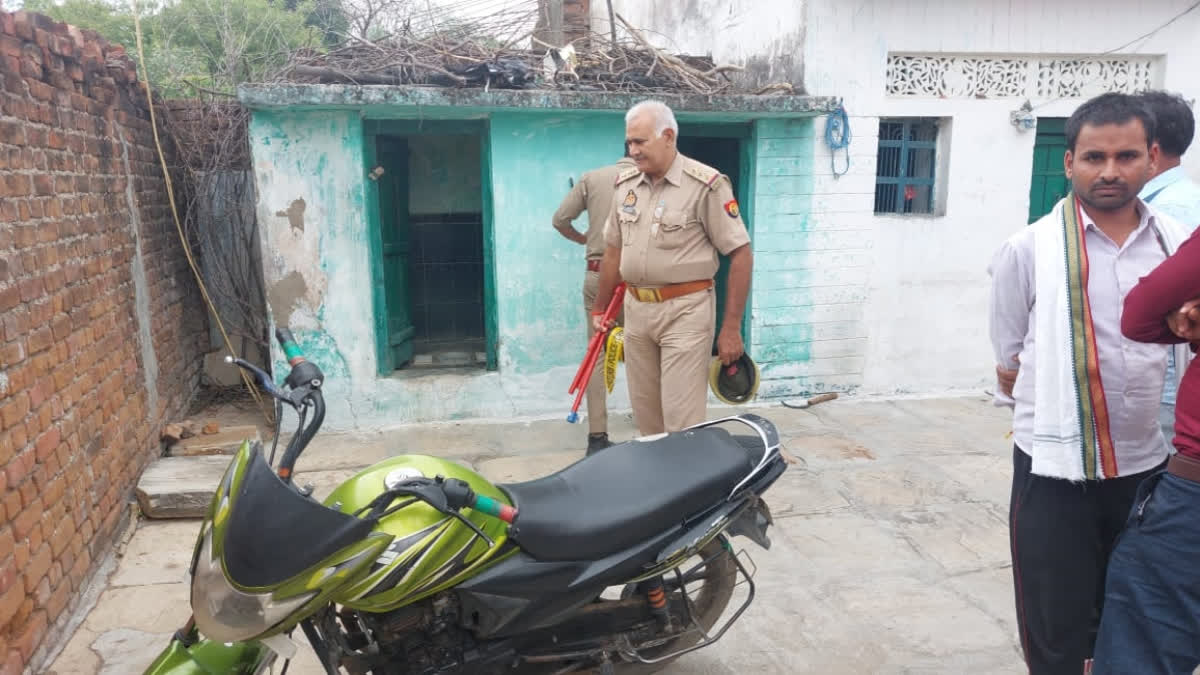 Cops inspect the crime scene at Basela village of Kotwali Rath.