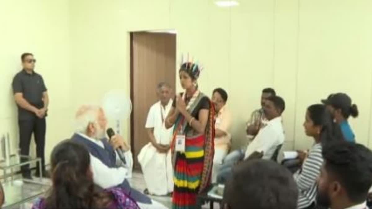 PM Modi interacts with members of Hakki Pikki tribe