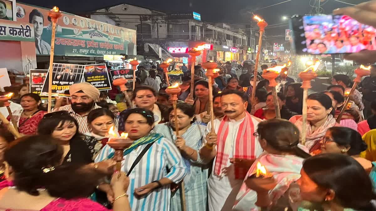 mahila congress took out torch procession