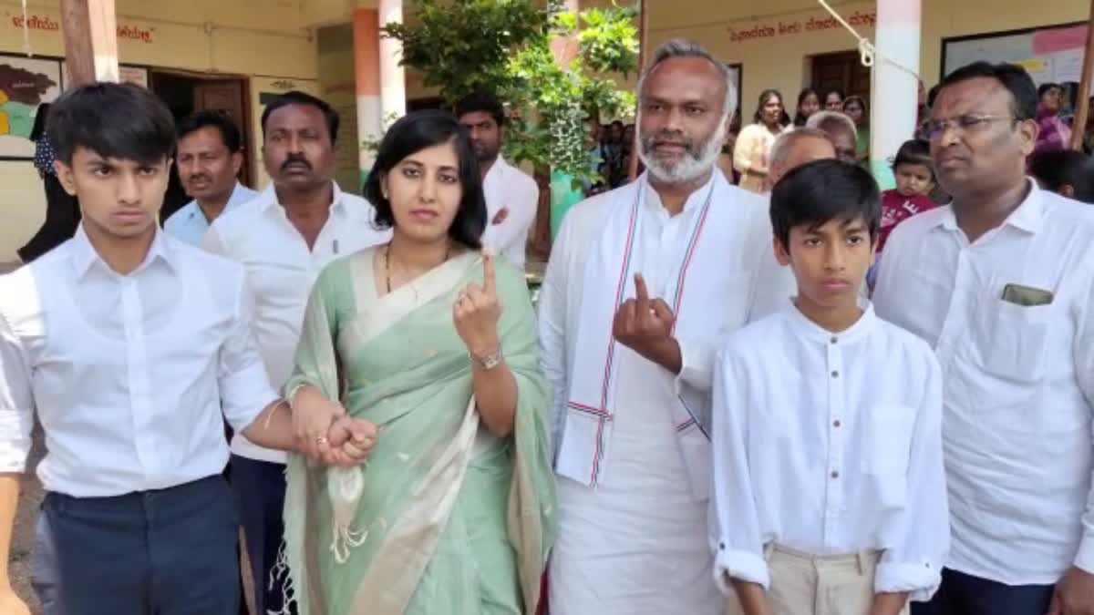 Priyank Kharge and his wife Shruti cast their votes in kalaburagi