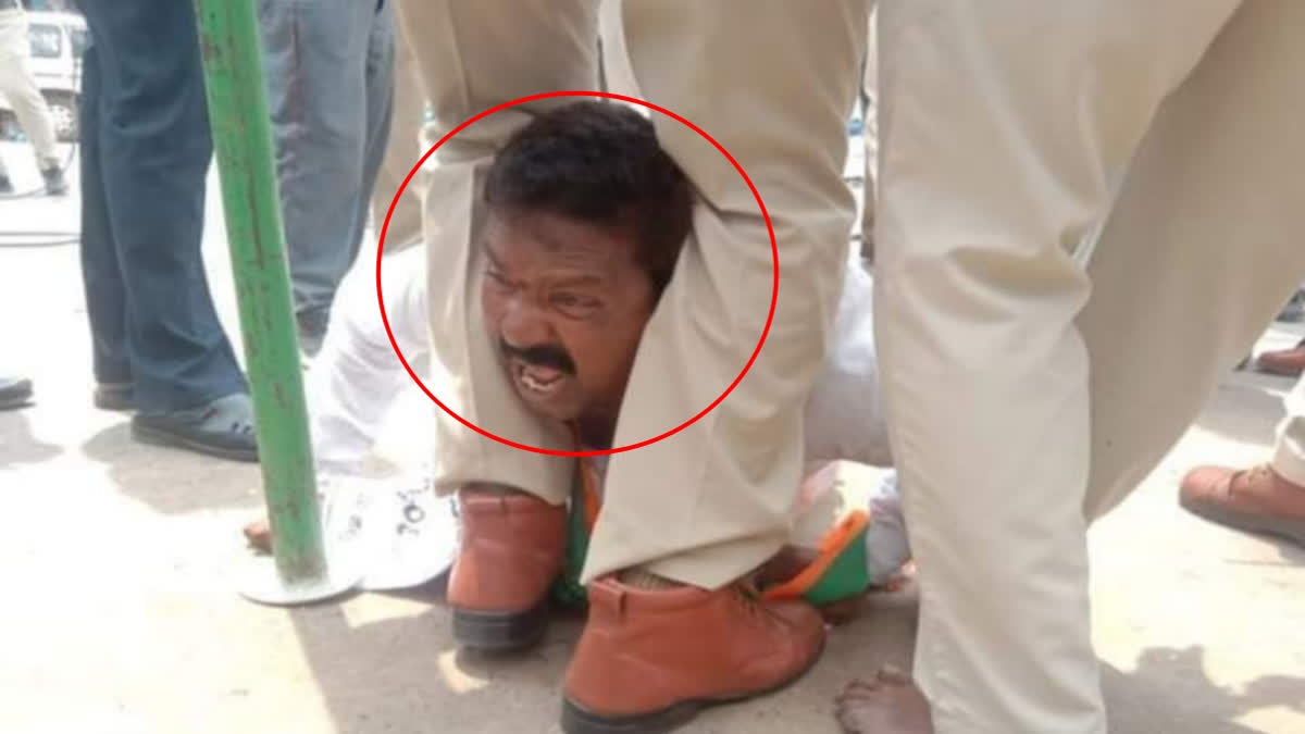 Police Trampled on BJP leader head with feet