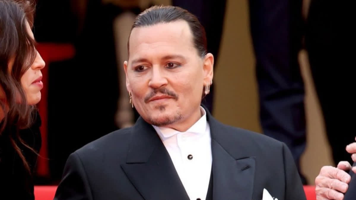 Johnny Depp holds back tears after receiving 7 min standing ovation for Jeanne Du Barry