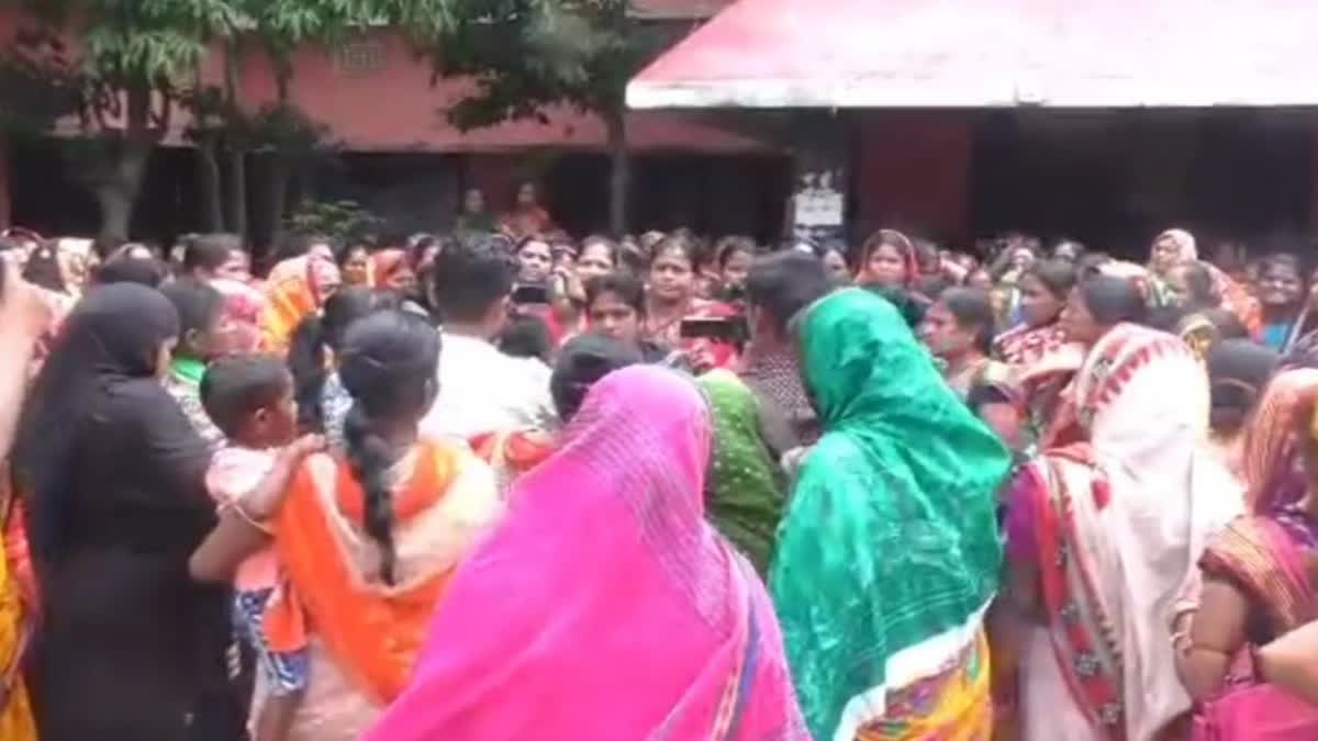 women protest in front of bdo office