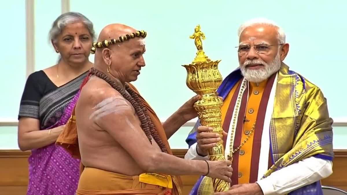 new parliament inauguration  sengol handed over to pm modi  sengol pm modi  pm modi  pm modi sengol  sengol  new parliament  സ്വർണ ചെങ്കോൽ ഏറ്റുവാങ്ങി പ്രധാനമന്ത്രി  പാർലമെന്‍റ്  പുതിയ പാർലമെന്‍റ്  പുതിയ പാർലമെന്‍റ് ചെങ്കോൽ  ചെങ്കോൽ  പ്രധാനമന്ത്രി മോദി  നരേന്ദ്ര മോദി  ചെങ്കോൽ ഏറ്റുവാങ്ങി  മോദി ചെങ്കോൽ