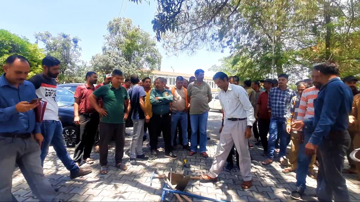 Housekeeping staff protest against NIT Hamirpur management.