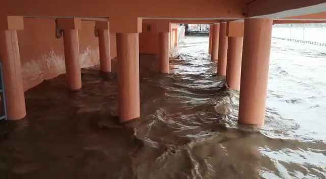 ganga flowing by touching statue of lord shiva