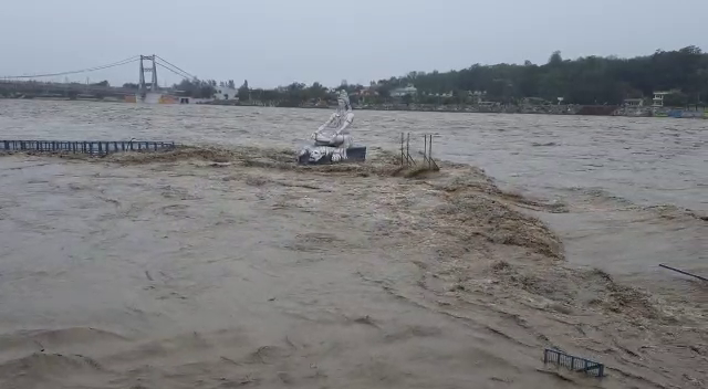 ganga flowing by touching statue of lord shiva