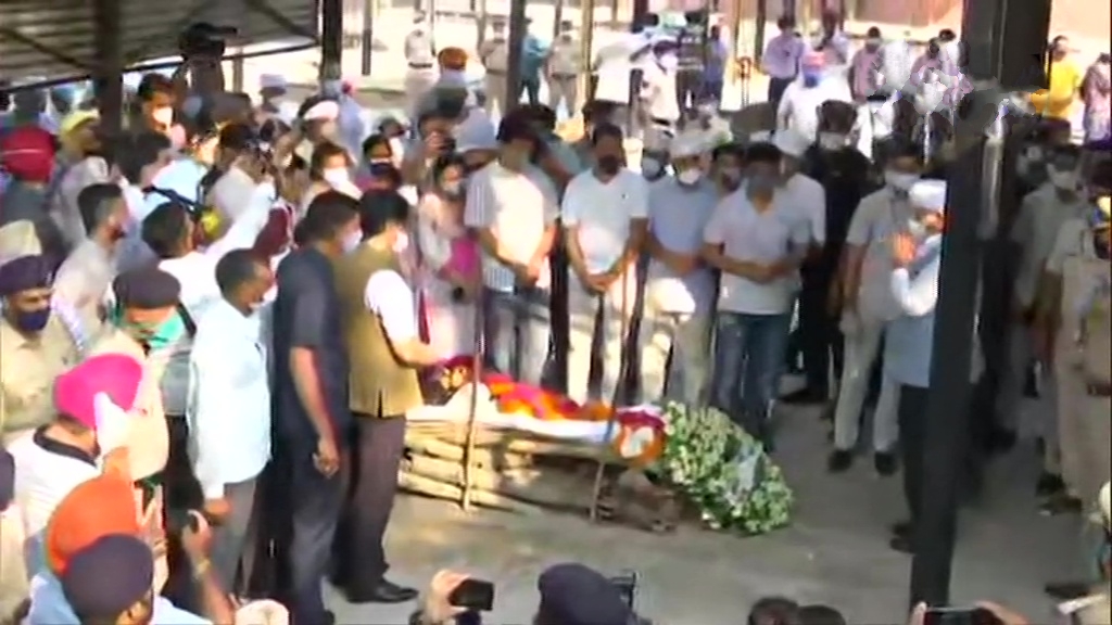 Milkha Singh's funeral is complete