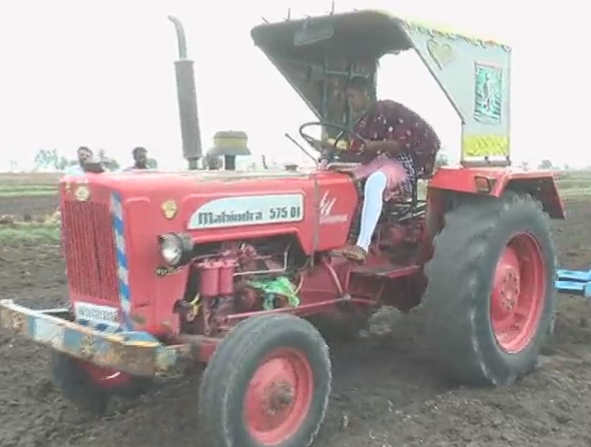 girl on tractor