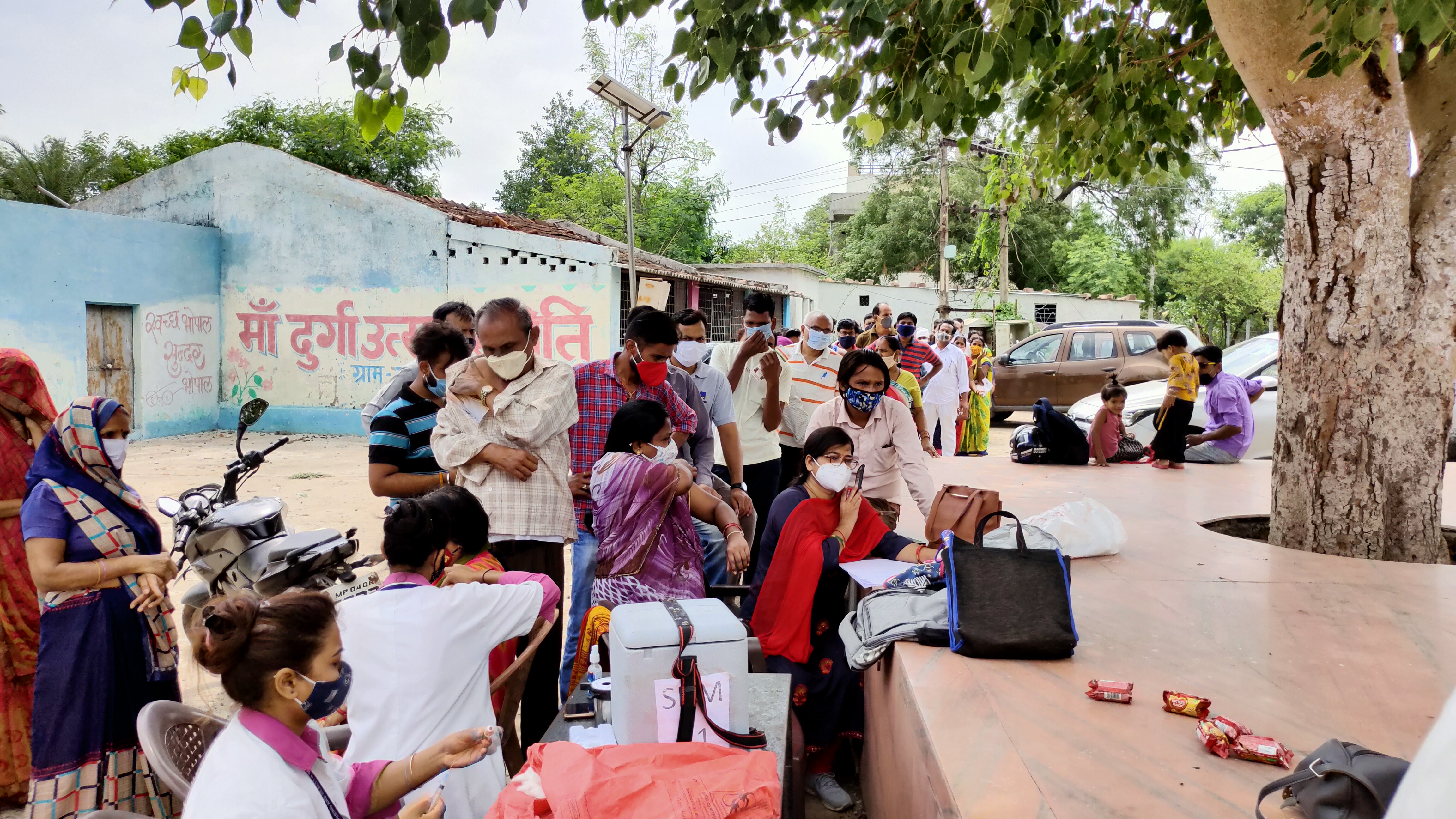 people waiting for vaccine in bhopal