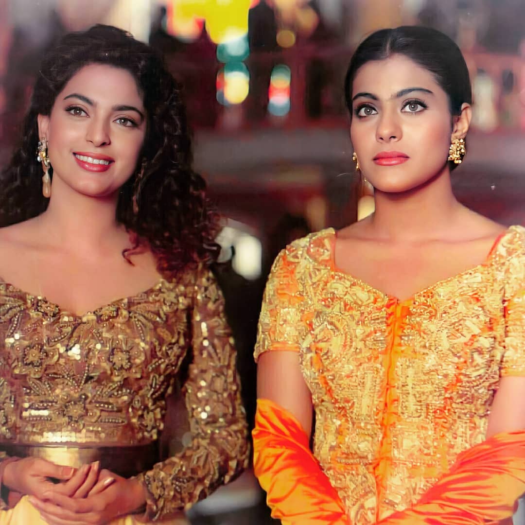 Juhi Chawla and Kajol posing for the shutterbugs