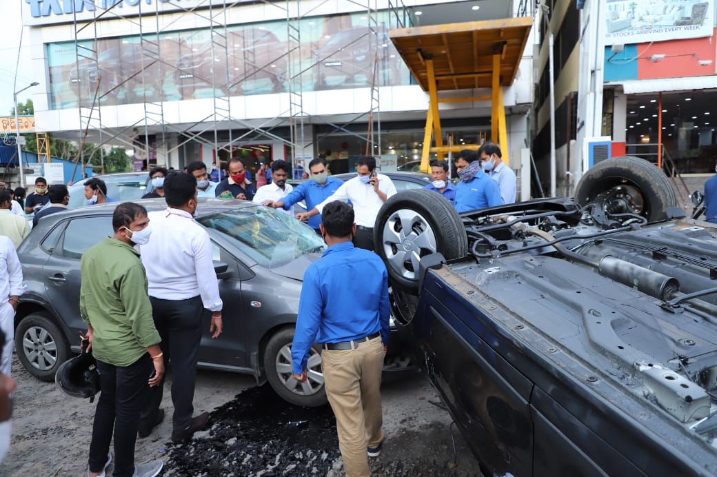 Car suddenly overturns from first floor when buying in showroom in hyderabad