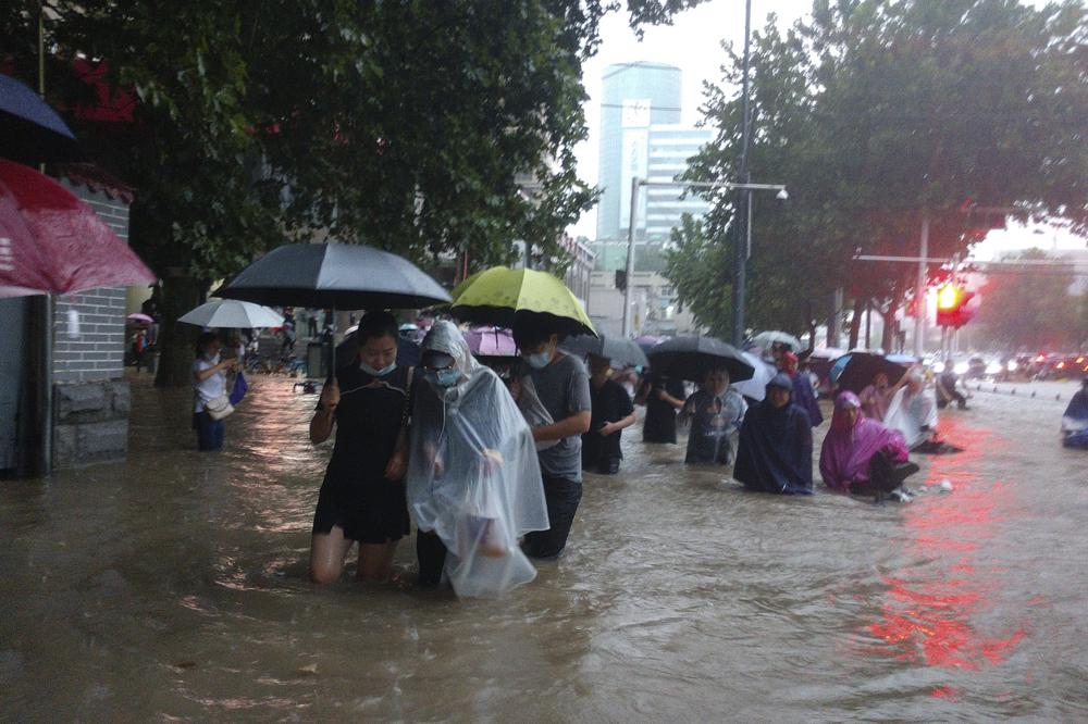 12 killed in heavy rain, floods in central China