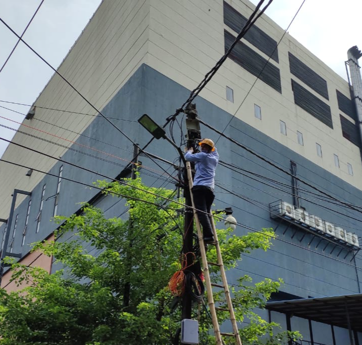 Electricity department employees working