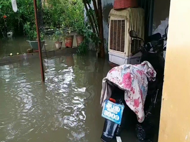 railway colony of koderma submerged in rain