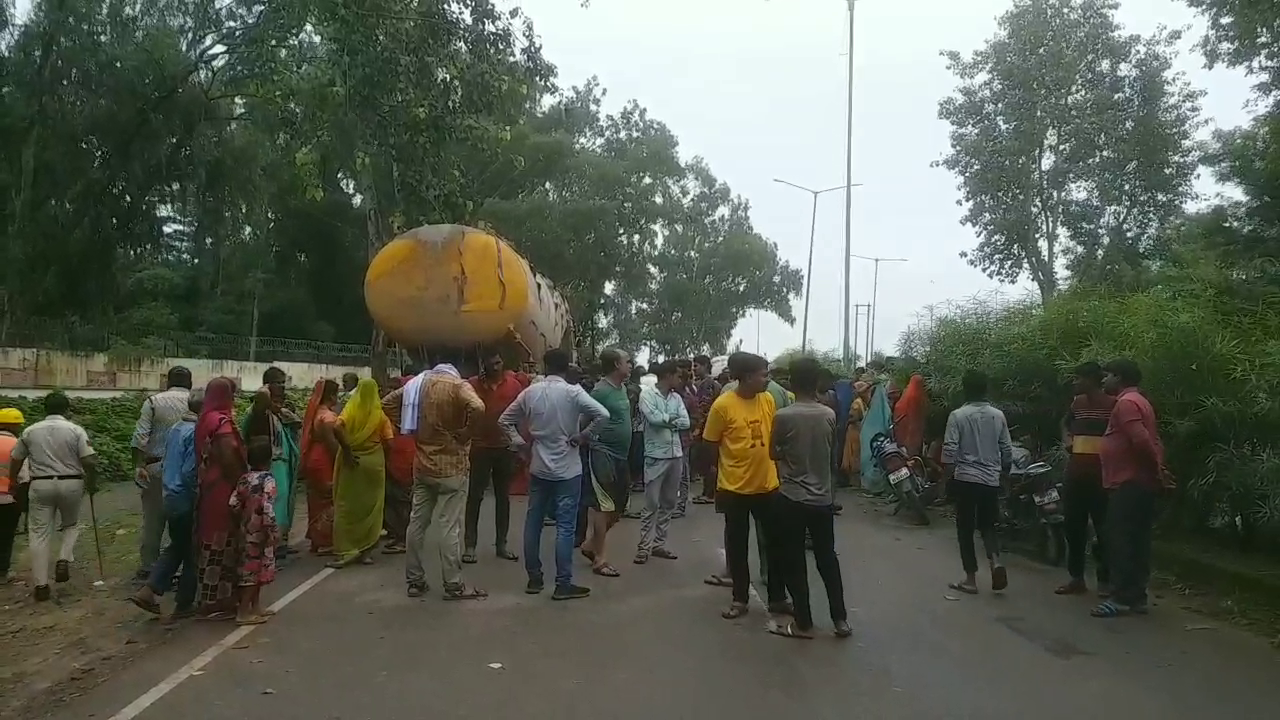 trucks parked on both sides of the road