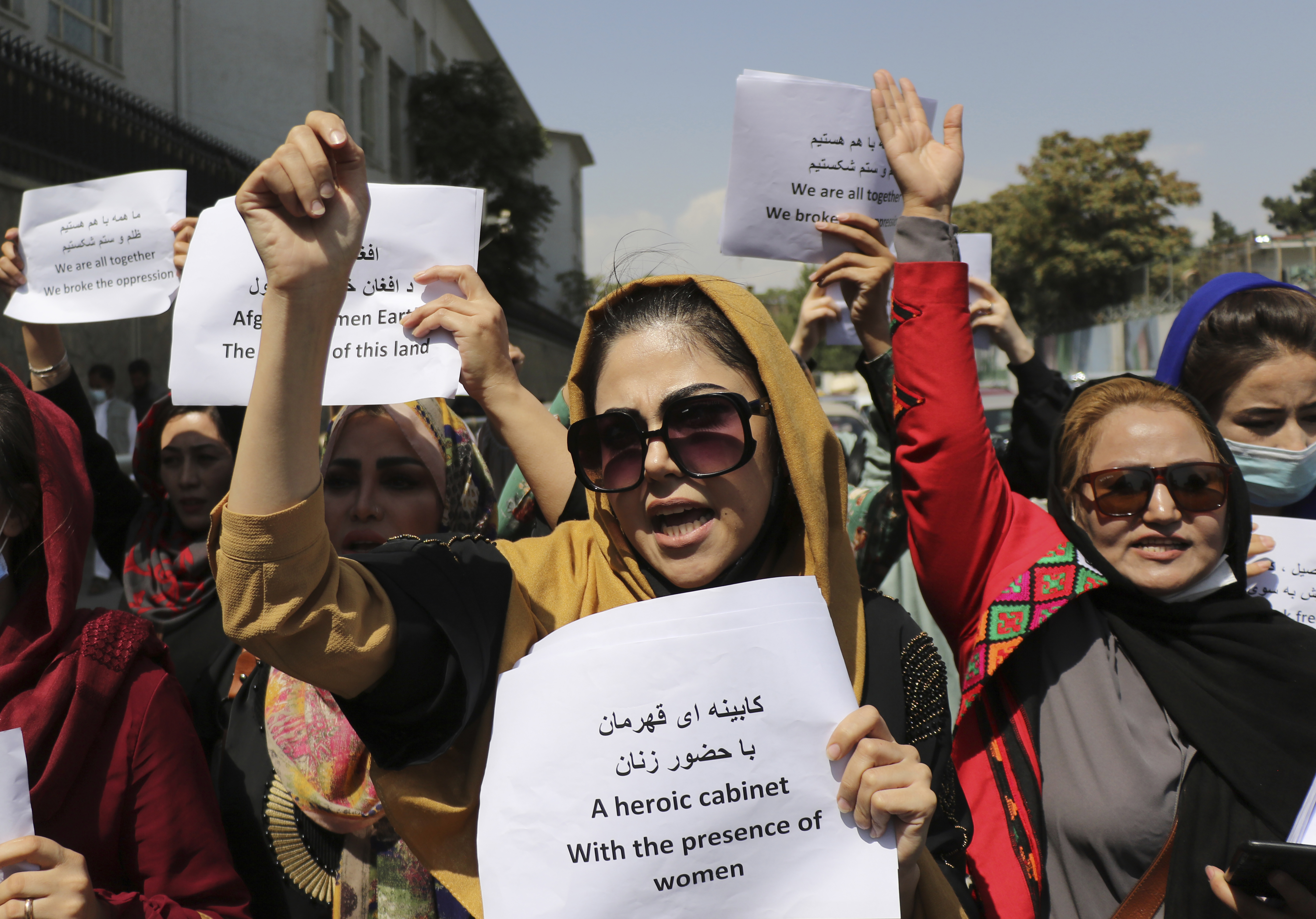 dozens march for womens rights at kabul palace