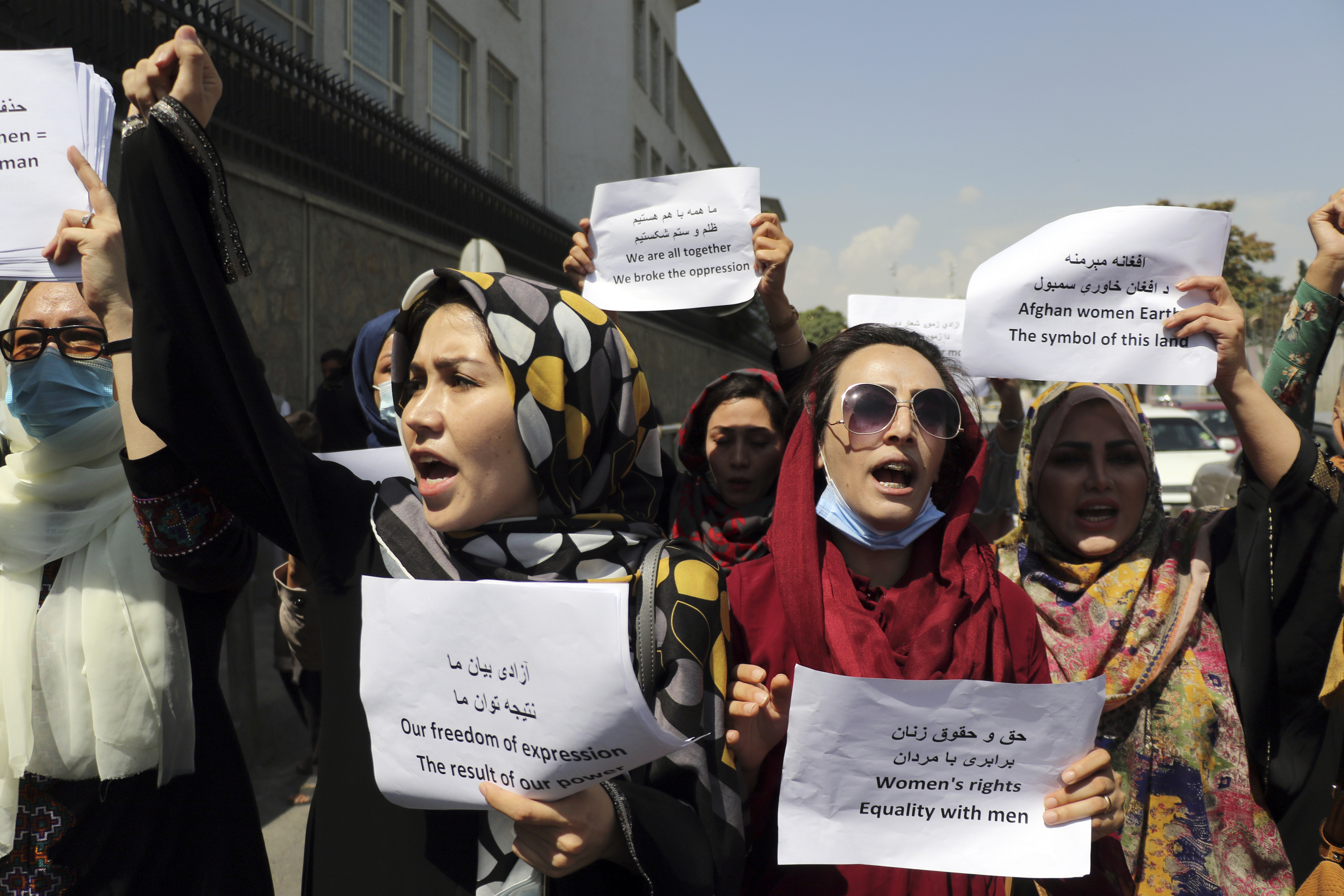 dozens march for womens rights at kabul palace