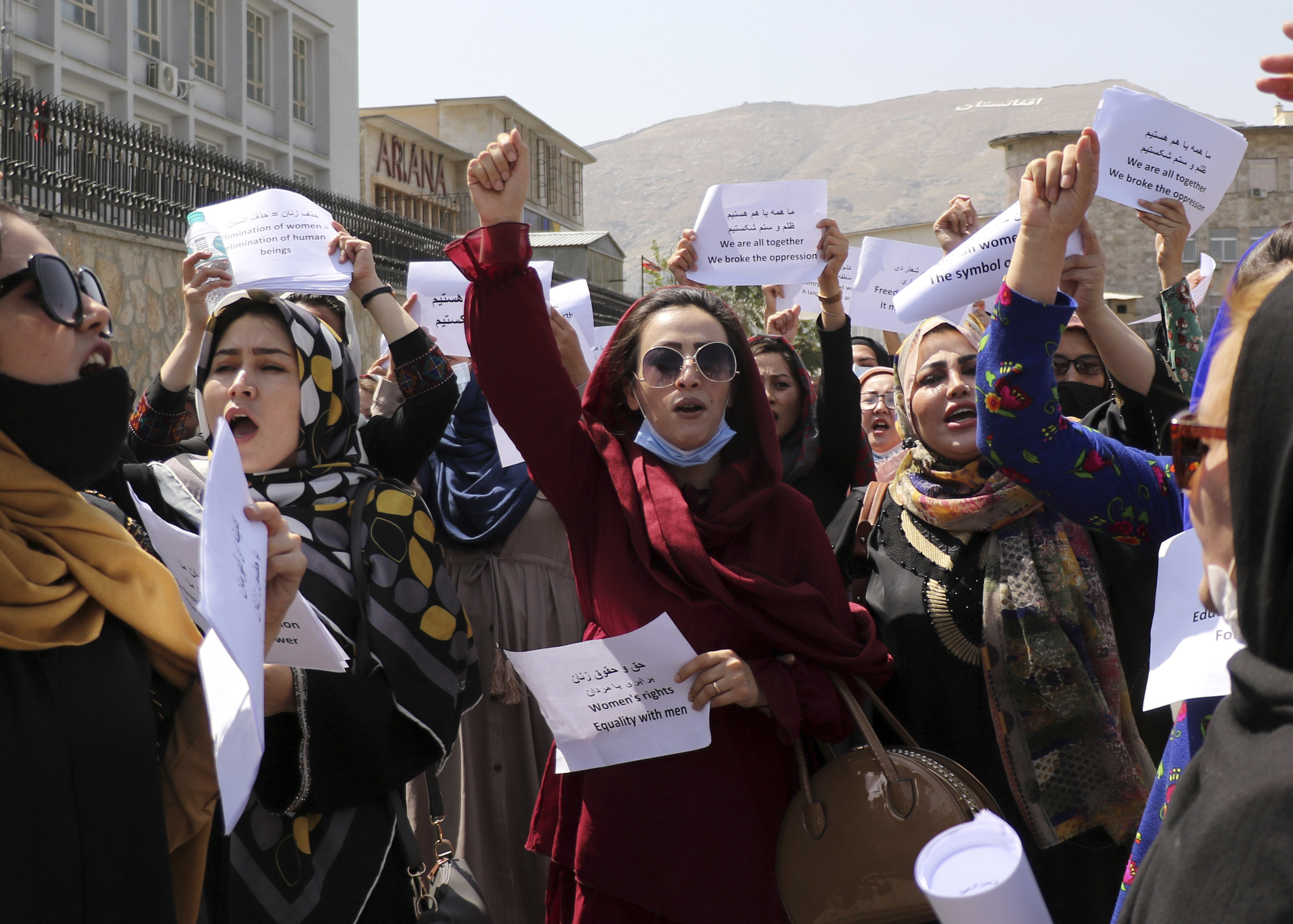 dozens march for womens rights at kabul palace