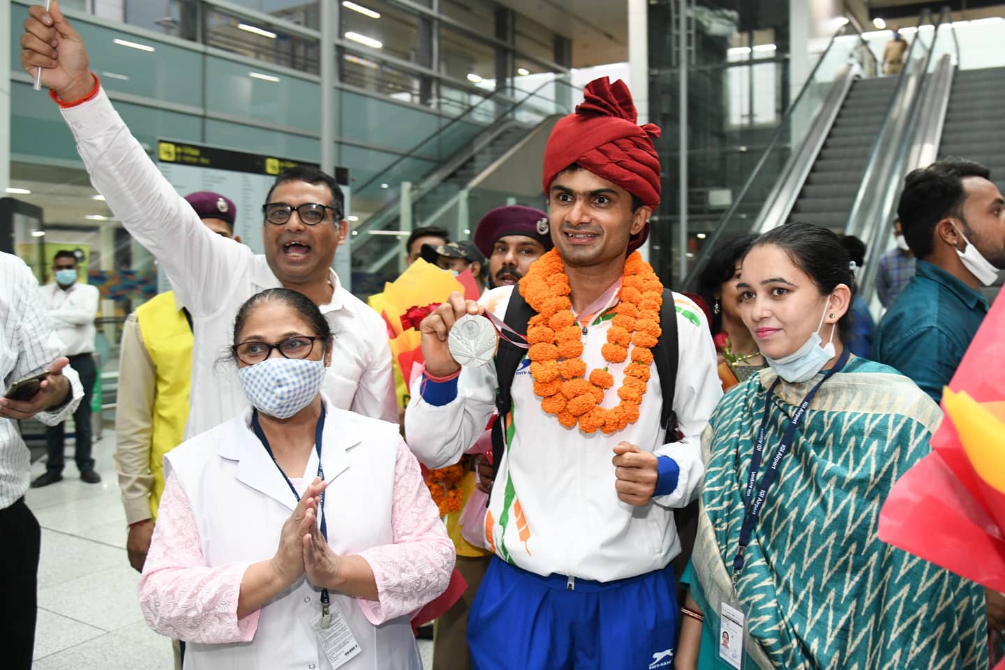 India's history-making Paralympians return to rousing reception