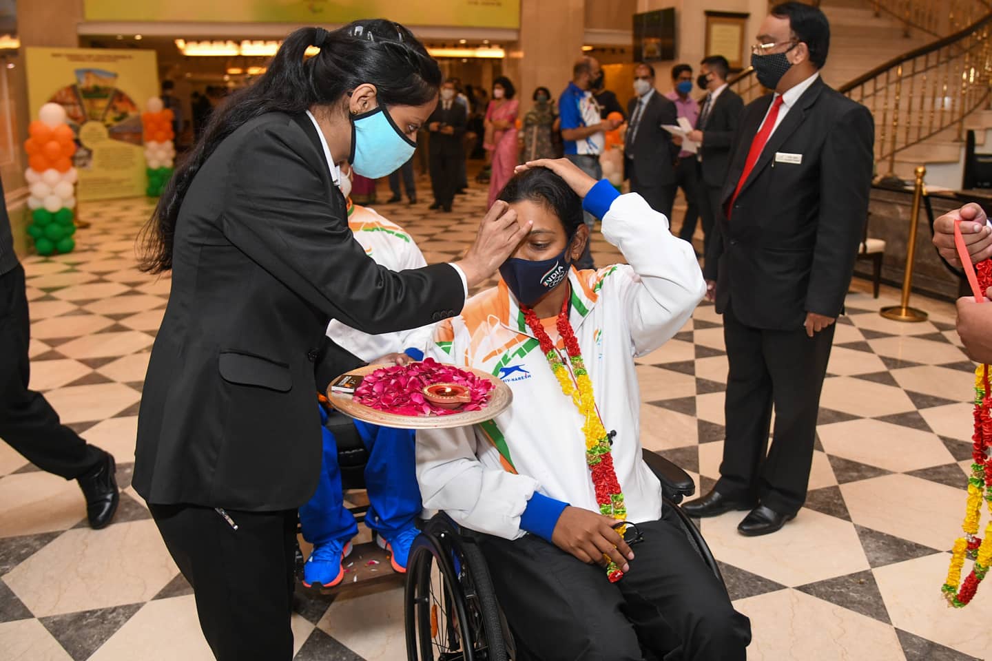 India's history-making Paralympians return to rousing reception