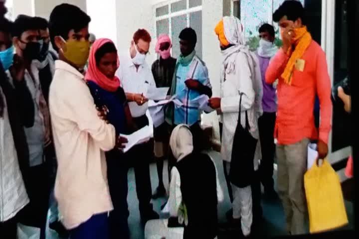 villagers meet to collector