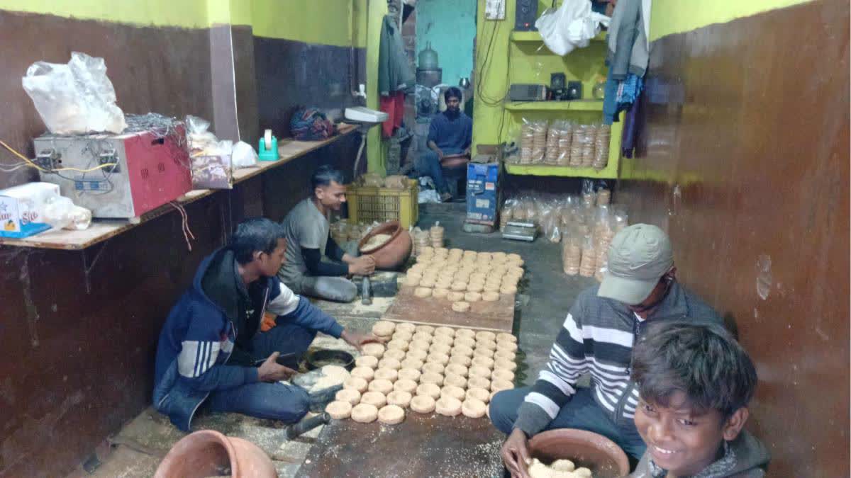 Tilkuts are in the making at a shop in Gaya's Dhangra