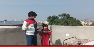 Kites fly in Amritsar on Lohri festival, happy faces of small children