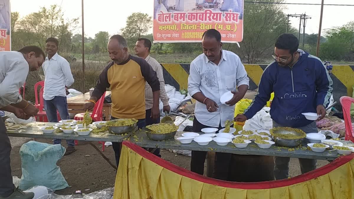 DISTRIBUTE HALWA PURI TO DEVOTEES