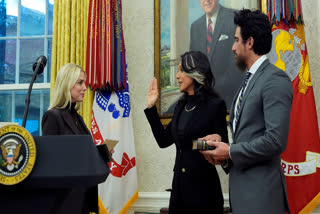 Attorney General Pam Bondi swears in Tulsi Gabbard as the Director of National Intelligence in the Oval Office of the White House, Wednesday, Feb. 12, 2025, in Washington, as her husband Abraham Williams watches.