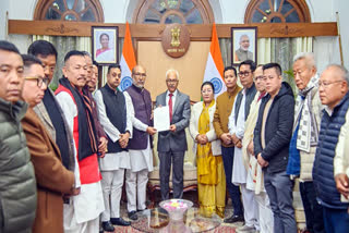 Manipur CM N Biren Singh hands over the letter of resignation from the post of Chief Minister to Governor Ajay Kumar Bhalla, at Raj Bhavan in Imphal on Sunday.