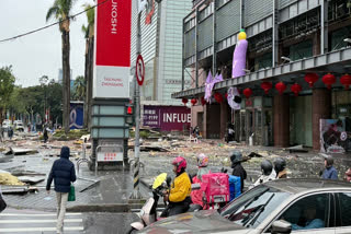 This picture taken and released by Taiwan’s Central News Agency (CNA) on February 13, 2025 shows the scene after an explosion at a department store in Taichung.  An explosion in a Taiwan department store on February 13 injured at least 12 people, authorities said, with videos showing large pieces of debris raining down on the street.