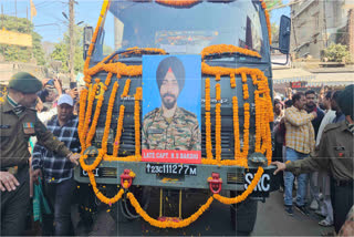 The mortal remains of Captain Karamjit Singh Bakshi, who was martyred in an IED blast along the Line of Control in Akhnoor sector of Jammu and Kashmir, was consigned to flames here amid cries of 'Bharat Mata ki Jai' and 'Jab Tak Suraj Chand Rahega Karamjit Singh Bakshi Tera Naam Rahega