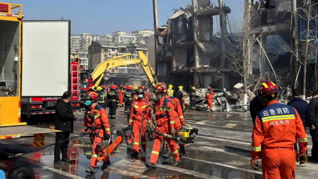 Rescuers were responding to a suspected gas leak explosion Wednesday in a building in northern China that has killed two people and injured 26.