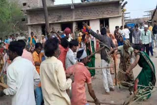 dewas tradition of beating man