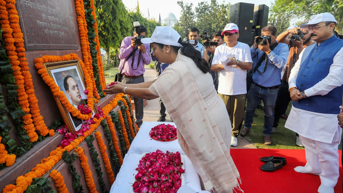 Delhi Chief Minister Rekha Gupta with Education Minister Ashish Sood pays tribute to Dr B R Ambedkar during a Walkathon 2025 event organised on the occasion of his 134th birth anniversary at Delhi Vidhan Sabha in New Delhi, Sunday, April 14, 2025.