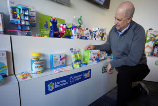 Rick Woldenberg, CEO of Learning Resources, an educational toy company, looks at products manufactured in China, at a showroom in Vernon Hills, Ill., Friday, April 11, 2025.