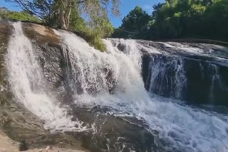 FLOOD IN KUMBAKARAI FALLS PHOTO