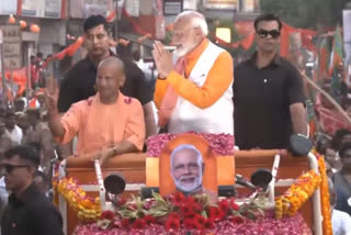 Prime Minister Narendra Modi began a six-kilometre-long roadshow in Varanasi. He was accompanied by Uttar Pradesh Chief Minister Yogi Adityanath.